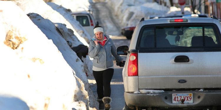 Evansville Residents Urged to Clear Sidewalks Amid Snowfall Hazards