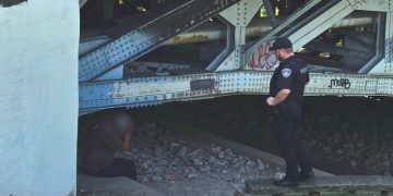 Evansville police officers connect man under Franklin Street Bridge with crisis team for help