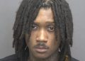 Evansville police arrest 20-year-old after finding gun with machine gun conversion device in vehicle