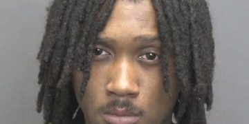 Evansville police arrest 20-year-old after finding gun with machine gun conversion device in vehicle
