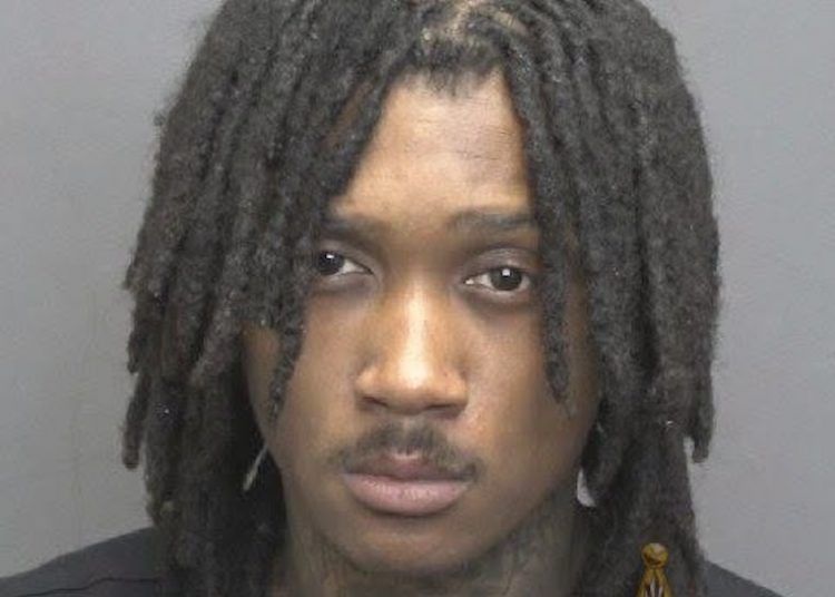 Evansville police arrest 20-year-old after finding gun with machine gun conversion device in vehicle